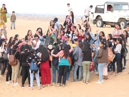 Camel safari in Thar desert under sunset